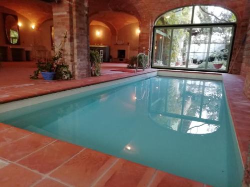 CASA MOZART - piscina interna giardino wifi eventi内部或周边的泳池