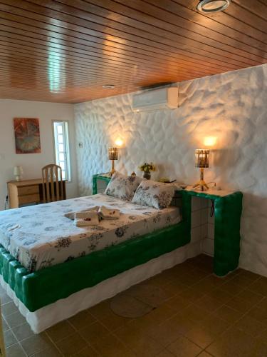 Taverna do Paraiso客房内的一张或多张床位