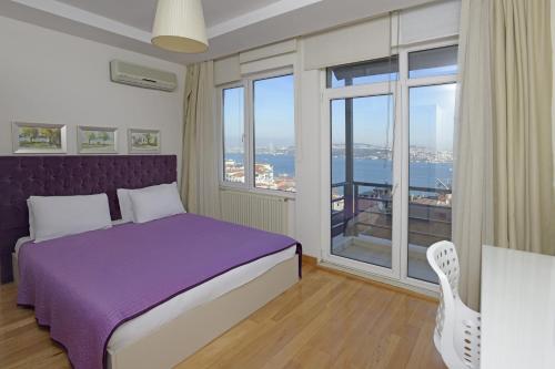 Cheya Taksim Istanbul City Center Comfort Residence客房内的一张或多张床位