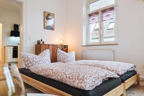 #1 AUGSBURG Altstadtjuwel客房内的一张或多张床位