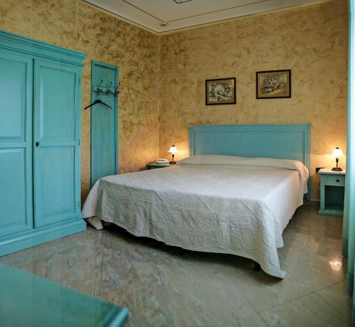 曼努酒店 客房内的一张或多张床位