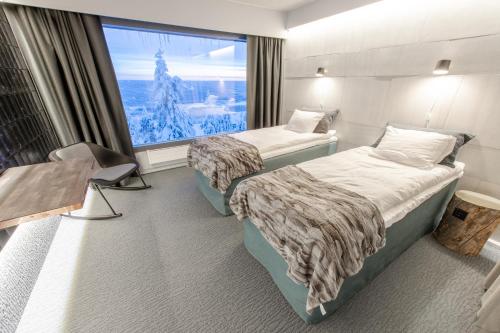 Hotel Iso-Syöte客房内的一张或多张床位