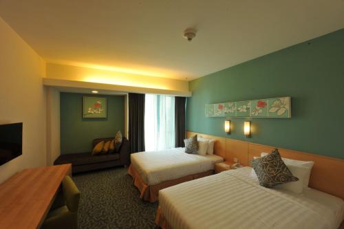 普特拉贾亚艾佛利普特拉贾亚酒店的酒店客房设有两张床和电视。