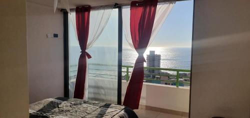 departamento NEO vista al mar 2 piezas客房内的一张或多张床位