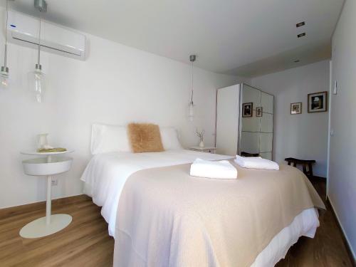 Casa da Mouraria客房内的一张或多张床位