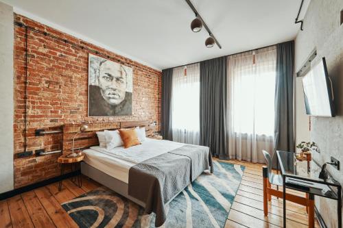 ARTHOTEL STALOWA 52客房内的一张或多张床位