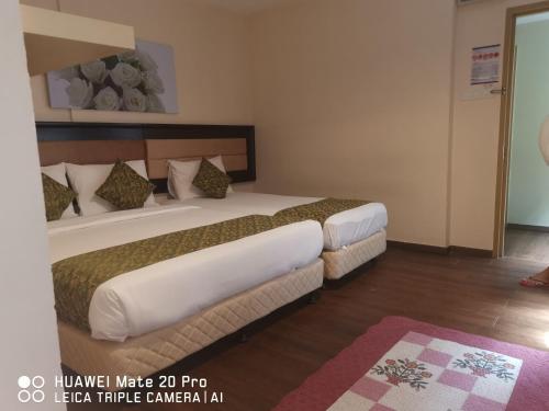 Yeob Bay hotel Ampang客房内的一张或多张床位