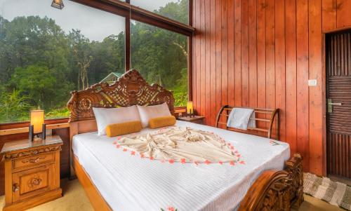 Mandaram Eco Resort客房内的一张或多张床位