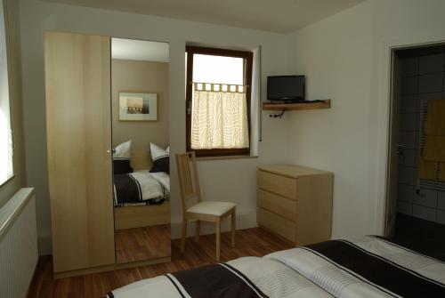 Gästezimmer zwischen Neckar und Enz客房内的一张或多张床位