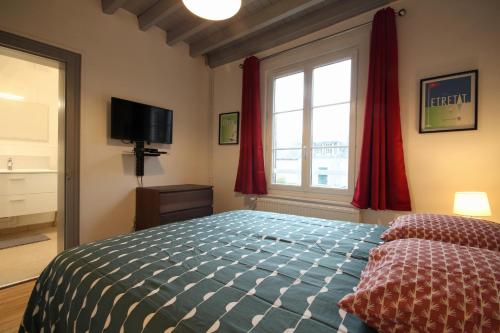 Au bonheur d'Etretat客房内的一张或多张床位