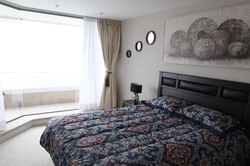 Condominio San Alfonso Del Mar - Vista Inmejorable客房内的一张或多张床位