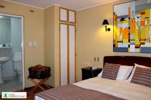 阿美利加诺酒店客房内的一张或多张床位