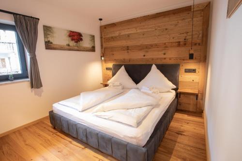 Apartment Wood&Stone Alpi客房内的一张或多张床位