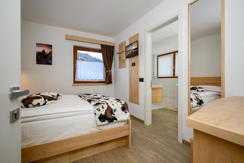 B&B B&Beautyfol Dolomites adults only客房内的一张或多张床位