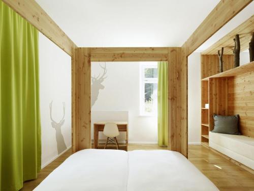 seehaus forelle haeckenhaus客房内的一张或多张床位