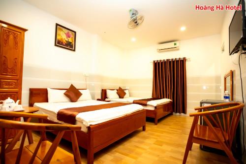Hoàng Hà Hotel客房内的一张或多张床位