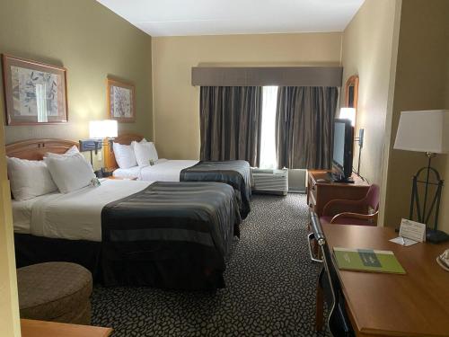 特温德姆小石城温盖特酒店客房内的一张或多张床位