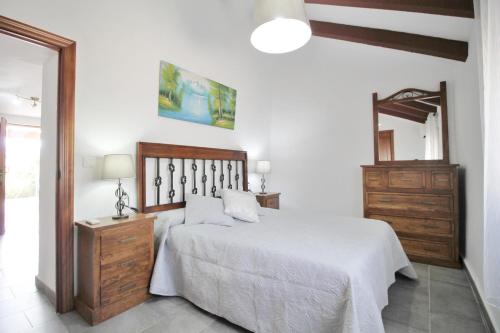 Villa la Marina SpainSunRentals 1106客房内的一张或多张床位