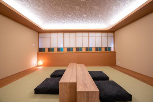 marutto Ishikawa客房内的一张或多张床位