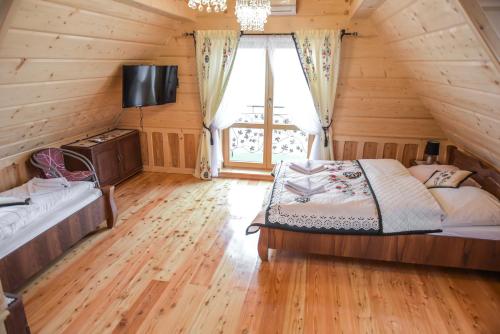 Rajska Oaza客房内的一张或多张床位