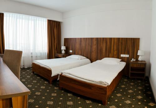 斯奎尔酒店客房内的一张或多张床位