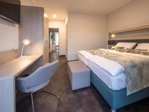 RS-HOTEL - smart & modern Hotel Apartments客房内的一张或多张床位