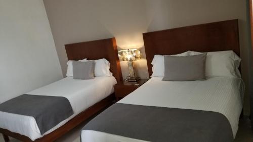 Hotel Parga客房内的一张或多张床位