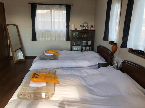 Guesthouse Gifu SUAI客房内的一张或多张床位