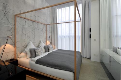 Luxury Omaruru-Design-Apartment Deluxe客房内的一张或多张床位