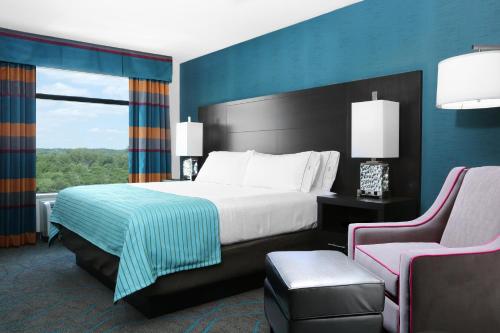 莫林智选假日酒店 - 跨德城市地区客房内的一张或多张床位