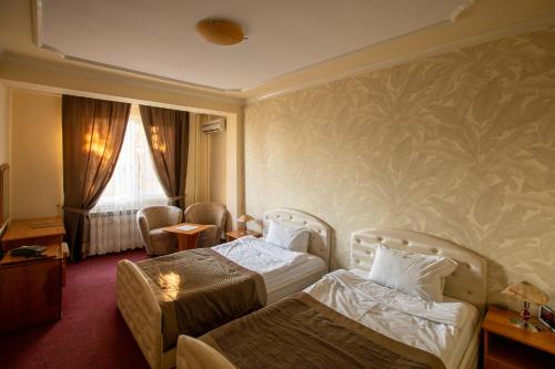 松尼察酒店客房内的一张或多张床位