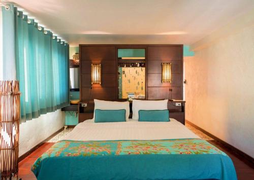 Vacation Village Phra Nang Inn - SHA Extra Plus客房内的一张或多张床位