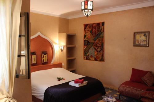 莎米亚沙丘庭院旅馆客房内的一张或多张床位