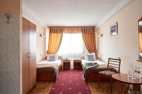 Hotel Druzhba客房内的一张或多张床位