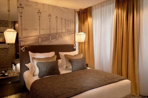 Hotel La Lanterne & Spa客房内的一张或多张床位