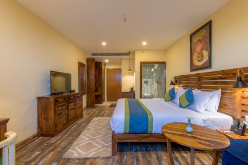Aagantuk Resort客房内的一张或多张床位