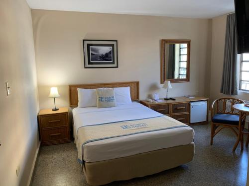 Canario Lagoon Hotel客房内的一张或多张床位