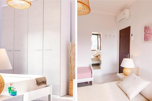 马尔恰纳Casa Gelso的白色卧室配有床和椅子