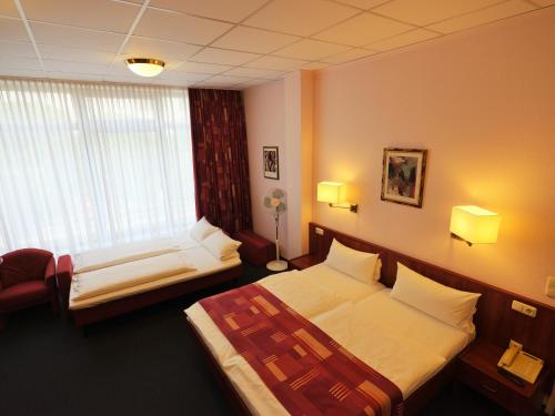 卡博尼特劳施酒店客房内的一张或多张床位