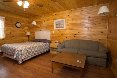北鲁斯蒂科度假村客房内的一张或多张床位