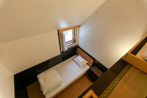 Niseko Ski Lodge - Hirafu客房内的一张或多张床位