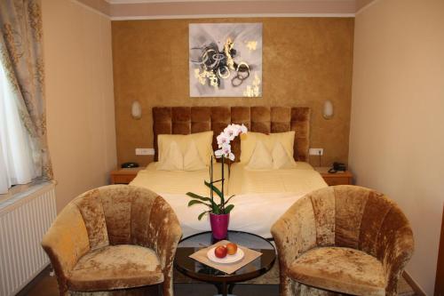 Hotel Lang客房内的一张或多张床位