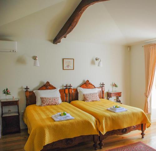 Casa Mindela Farmhouse客房内的一张或多张床位