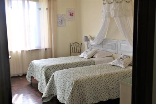 CASA VACANZE CLAUDIA- 10 min da Siena客房内的一张或多张床位