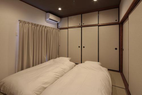 照宿 Terasu yado客房内的一张或多张床位