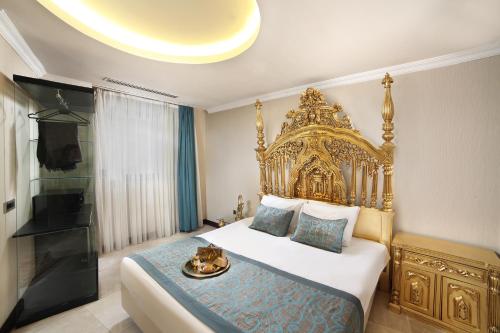 大财富SPA酒店客房内的一张或多张床位