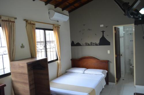 Hotel Balcon Llanero客房内的一张或多张床位