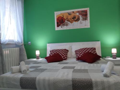 Casa Vacanze Ottantapassi客房内的一张或多张床位