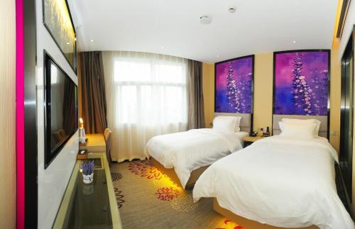 Lavande Hotels·Hangzhou Xiaoshan International Airport客房内的一张或多张床位