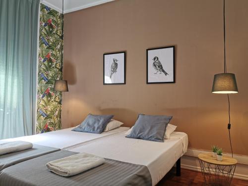 Castilho 63 Hostel & Suites客房内的一张或多张床位